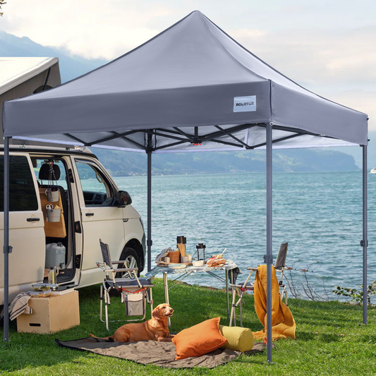 Gray 8' x 8' Bolotor pop-up tent providing lakeside camping shelter