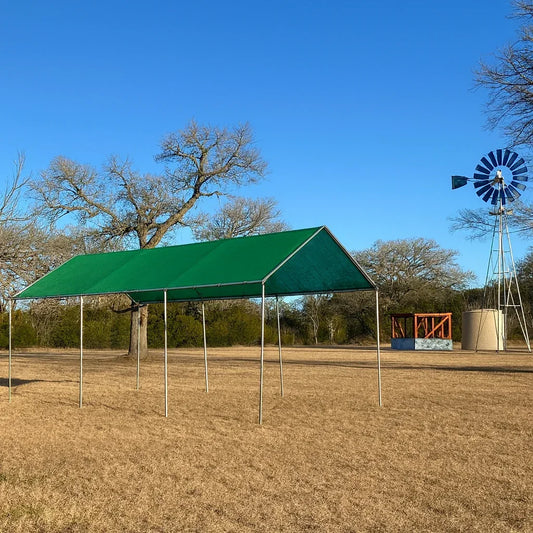 Green 10' x 20' mesh tarp canopy creating shade within a landscape setting