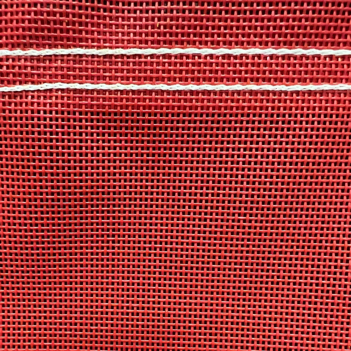 Red 20' x 30' vinyl mesh tarp showcasing high performance mesh and stitched borders