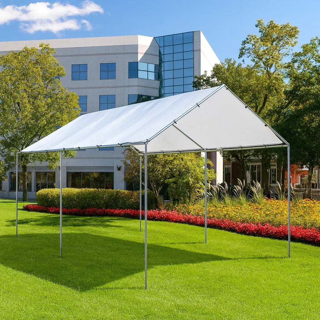 White 10' x 16' tarp canopy serving as an event shelter roofs