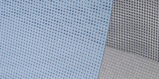 Turn Your Backyard Into a Chill Oasis With These Mesh Tarp Ideas.