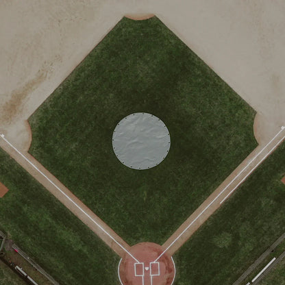 25' Silver Baseball Mound Cover placed over a baseball pitching mound