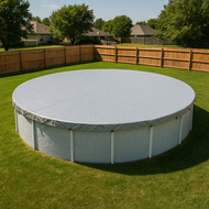 Round above-ground pool with cover on grassy lawn