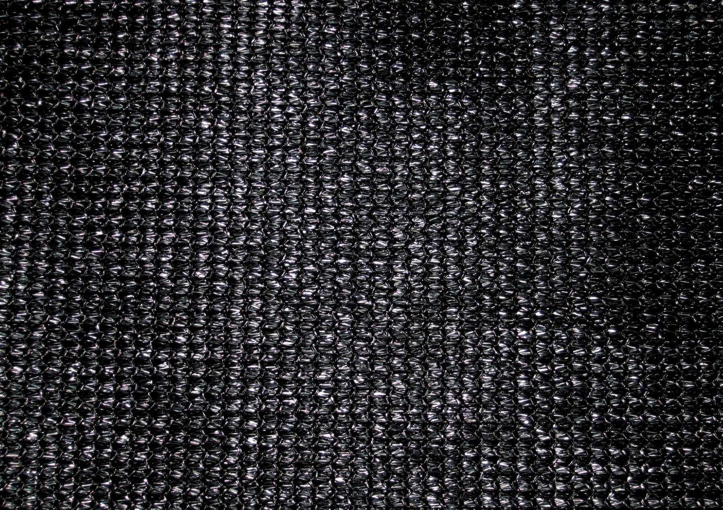 Black 10' x 12' 86% super shade mesh tarp featuring dense mesh texture detail