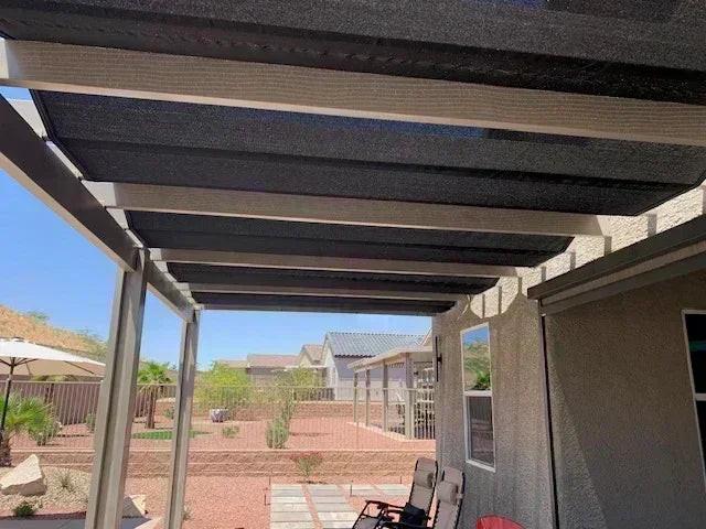 Black 20' x 40' 86% super shade mesh tarp installed for large shade coverage