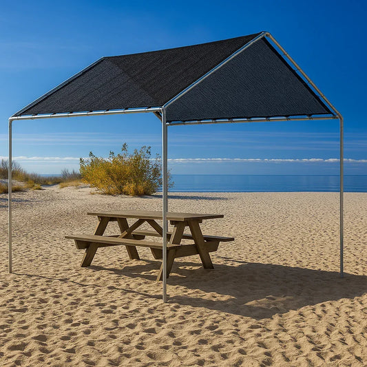 Black 10' x 10' mesh tarp canopy providing shade over a beach picnic table