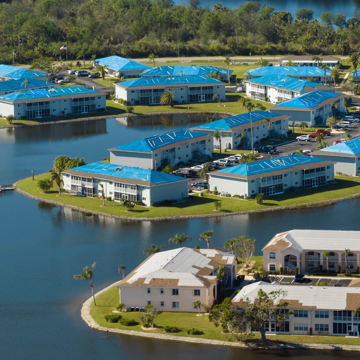 Blue hurricane tarp providing emergency coverage for coastal properties during storm preparation