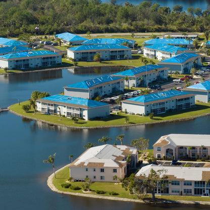 Blue hurricane tarp providing emergency coverage for coastal properties during storm preparation