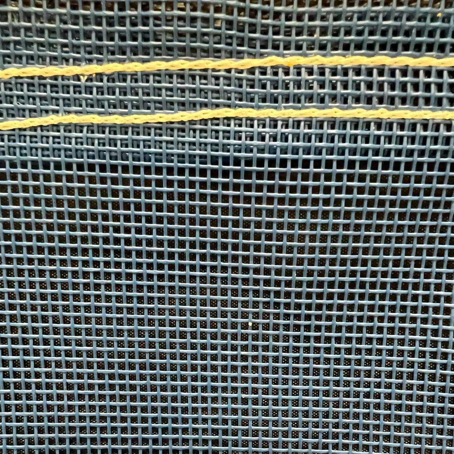 Blue 30' x 40' vinyl mesh tarp displaying flexible vinyl mesh and strong edge trim