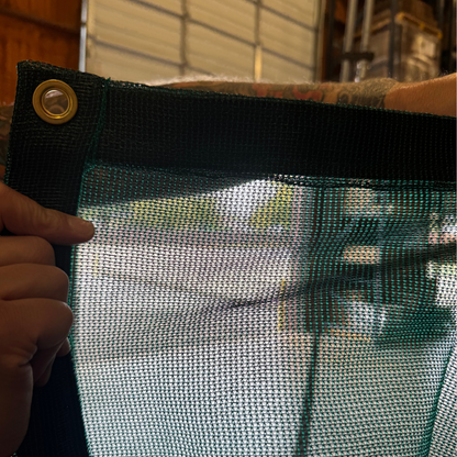 Closeout 60% green mesh tarp 8' x 50' providing a ventilated cover solution for outdoor protection