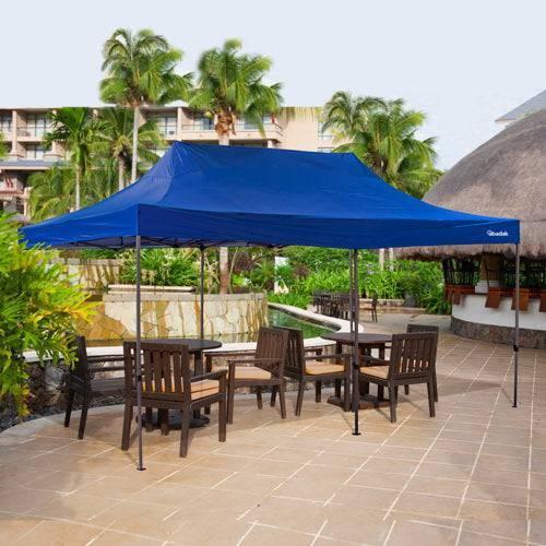 10' x 20' Diamond pop-up tent providing shelter in a marketplace setting