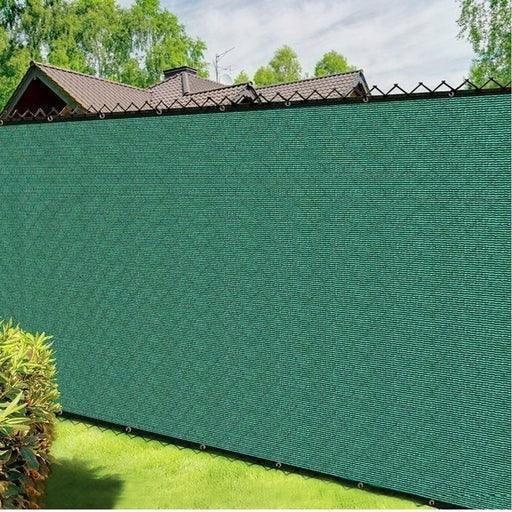 Green 6' x 50' 90% privacy fence mesh tarp mounted to a chain link fence