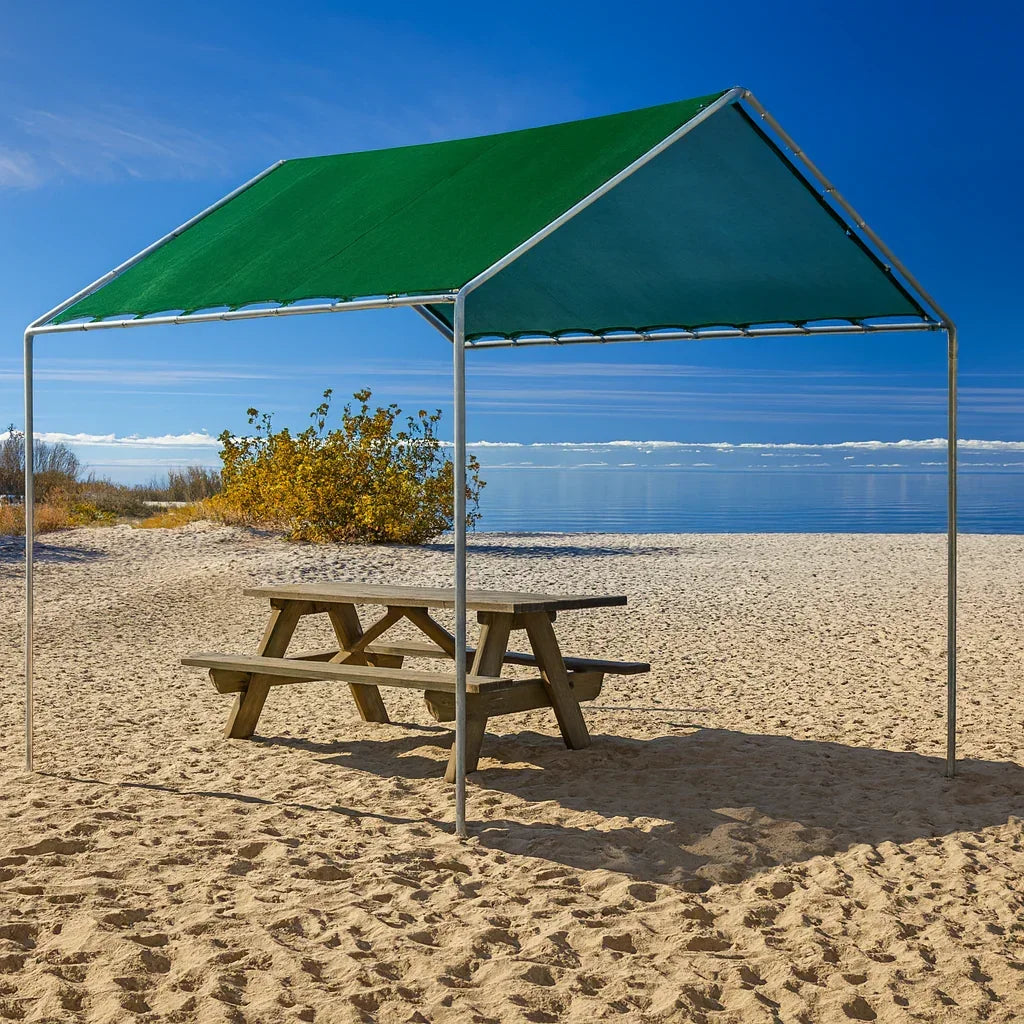 Green 10' x 10' mesh tarp canopy creating coastal relaxation shade