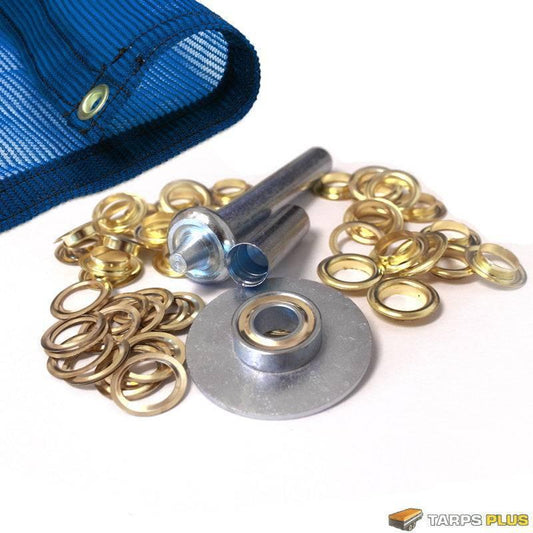 Grommet repair kit featuring brass eyelets, setting tools, and installation hardware for tarp repairs