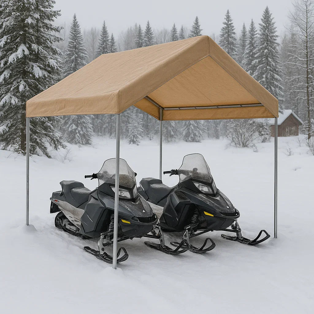 Tan 10' x 10' valance tarp providing shelter for snowmobiles in winter conditions