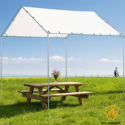 White 10' x 10' tarp cover providing open air shelter over a picnic table
